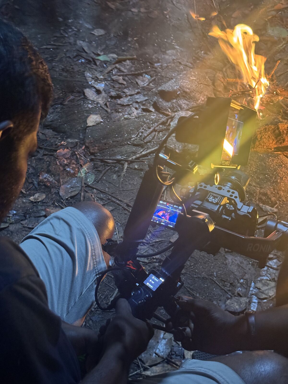 Crew setting up equipment for a production scene